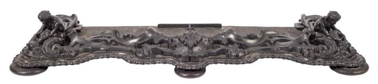 A Victorian cast iron fender in Rococo revival style, possibly Coalbrookdale Foundry,
