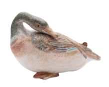 A Japanese Kutani porcelain model of a goose its head resting on its back, late Meiji, 9.