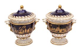 A large pair of Derby 'chinoiserie' wine coolers and covers the handles in the form of entwined