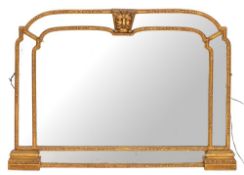 A carved and giltwood framed marginal overmantel mirror in Louis XIV taste,