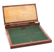 A 19th century mahogany and brass bound campaign writing slope of rectangular outline,