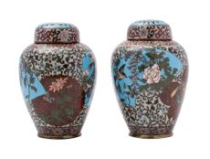 A pair of Japanese cloisonne vases and covers, of ovoid form,