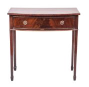 A mahogany bowfront side table in George III style,