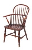 A Victorian elm, beech, ash and oak Windsor elbow chair,