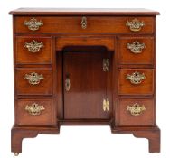 A George II mahogany kneehole desk,