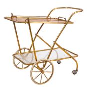 An Art Deco brass and walnut drinks trolley,