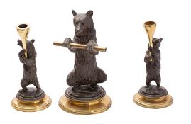 A Victorian bronze bear three-piece desk garniture includes a standing bear inkwell with hinged