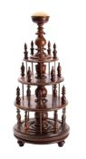 A 19th century rosewood bobbin stand of circular form,