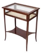 A mahogany and brass inlaid table a bijouterie,