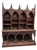 A Victorian carved oak bookcase in Gothic style,
