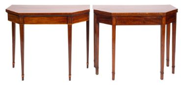 A matched pair of George III mahogany and line inlaid card tables,