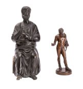 A small Italian patinated bronze figure of Narcissus and a bronze figure of St.