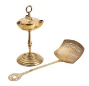 A brass Colza style lamp of triangular form with loop carrying handle,