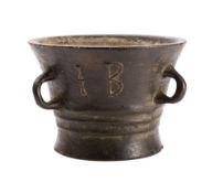 A late 16th century bronze mortar of traditional cylindrical tapering form,