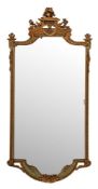 A painted and parcel giltwood and composition framed wall mirror in Adam taste,