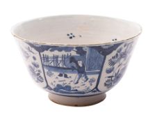 An English blue and white delftware chinoiserie punch bowl of straight sided tapering form with