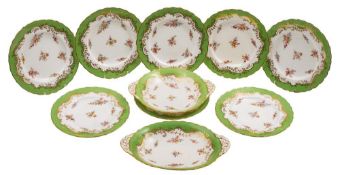 A Coalport porcelain part dessert service comprising an oval two handled dish,
