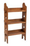 A 'Sedley' pegged oak open bookcase in Arts and Crafts style, for Liberty & Co.