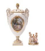 A Meissen pot pourri and cover and a small mythological group of four cherubs the vase with