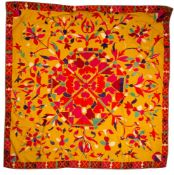 WITHDRAWN An Oriental square tasseled table covering with octagonal geometric medallion,