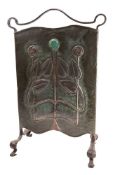An Art Nouveau copper fire screen,