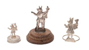 Three various silver Trusty Servant menu holders, the largest,