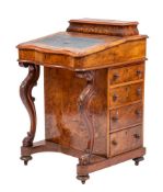 A Victorian walnut and marquetry serpentine front Davenport.