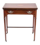 An Edwardian mahogany and inlaid enclosed writing table,