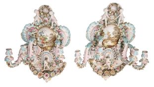 A pair of large German Dresden porcelain four-branch wall sconces,