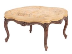 A carved and stained mahogany and embroidery upholstered centre stool in Louis XV style,