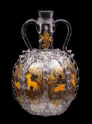 A Dutch globe and shaft two handled decanter,