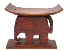 An Ashanti carved and stained hardwood stool, West Africa,