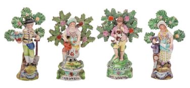 A matched pair of Salt pottery figures titled 'Boy and Dog' and 'Gardeners' and a similar pair of