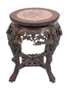 A Chinese carved hardwood and marble inset stand,