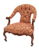 A Victorian carved walnut and button upholstered salon chair,