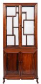 A Chinese stained hardwood display cabinet,