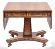 A George IV rosewood sofa table, circa 1825,