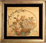 An early 19th century needlework picture depicting a basket of flowers,