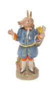 A polychrome painted biscuit porcelain model of the Trusty Servant,