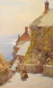 John White (British, 1851-1933) A young fisherman and a girl outside cottages on the coast.