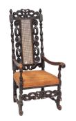 A Charles II carved and ebonised walnut open armchair, circa 1670,