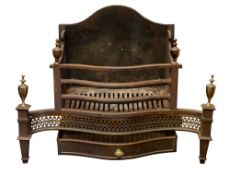 A steel and brass Georgian style fire basket of serpentine outline,