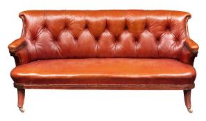 A Victorian mahogany and leather upholstered sofa,