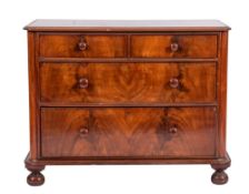 A Victorian mahogany chest of drawers, circa 1870; the top with ovolo edging,