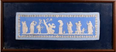 A blue and white 'Psyche and Cupid' plaster rectangular plaque in the Wedgwood manner decorated