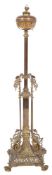 A Victorian brass lamp standard and shade with globe reservoir on a reeded stem and square column