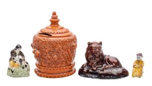 A mixed lot of late 18th/19th century English and Dutch pottery comprising a redware rustic money