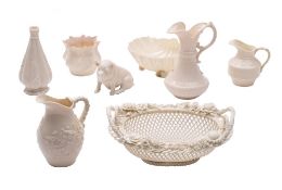 A collection of Belleek porcelains, including an oval three strand basket, an Ivy pattern cream jug,