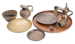 A Persian white metal inlaid lidded jug, a rosewater ewer, circular tray, four bowls/plates,