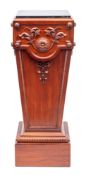 A mahogany and marble mounted plinth in 19th century taste,